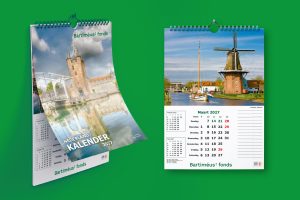 Visual met het voorblad en een maandblad van de kalender.
